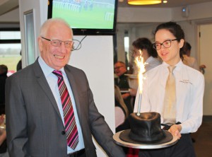 Birthday boy Brian receiving his cake