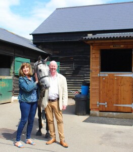 Bruce outside his box with two fans