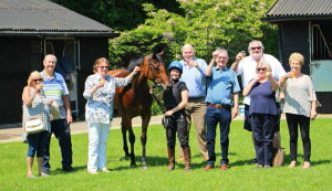 Solario Racing (Childwickbury) owners toast Twilight Bay