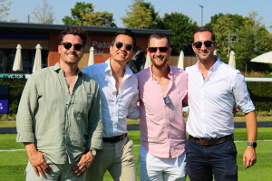 Charlie Hicks (second right) and friends in the paddock