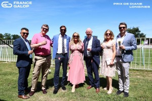 Happy owners and trainer before the action!